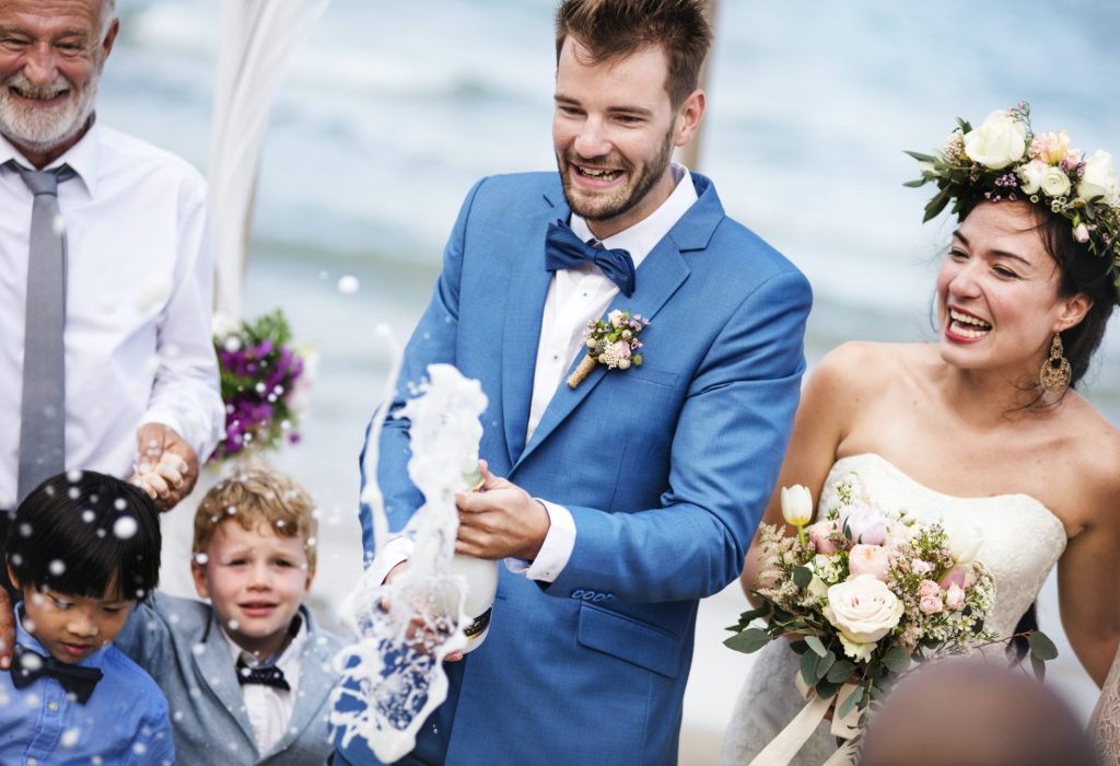young-couple-in-a-wedding-ceremony-at-the-beach-e1630316228823.jpg young-couple-in-a-wedding-ceremony-at-the-beach-e1630316228823.jpg